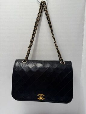 CHANEL Black Quilted Chain Strap Shoulder Bag with Gold Hardware Turn Lock